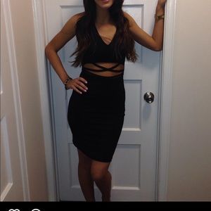 Solemio Los Angeles - Black halter dress with cutouts in the center